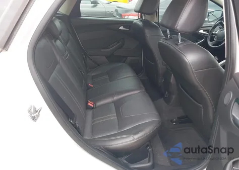 2013 Ford Focus Titanium из США, поврежденный, VIN 1FADP3N24DL183308